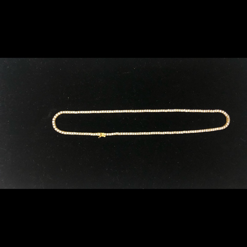 16 in. Gold tennis chain with diamonds